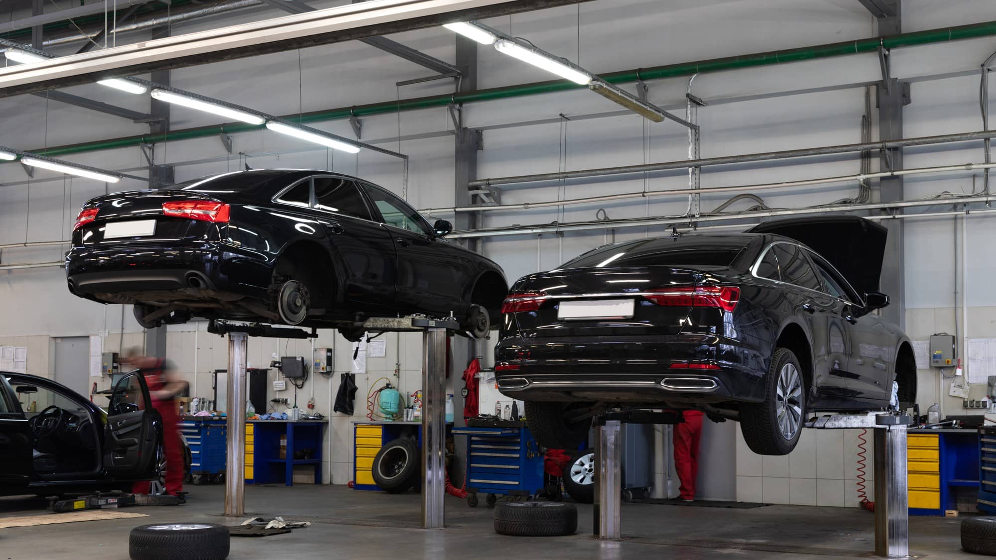 Image of 2 cars in a garage