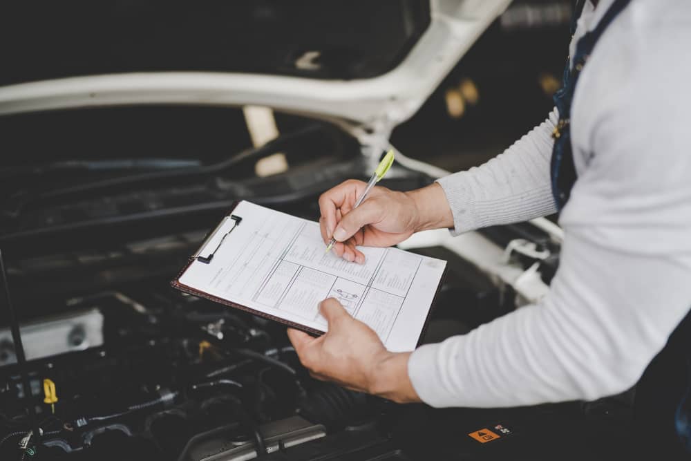 Image of 2 cars in a garage